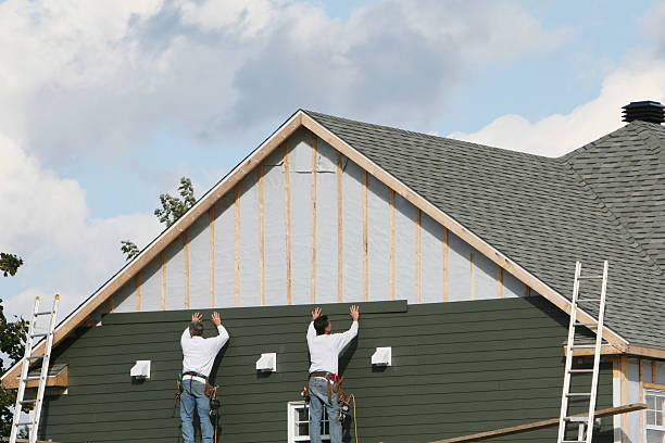 Professional Emergency Siding Repair technician working in Mingo Junction, OH